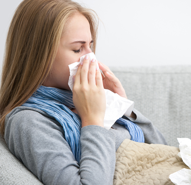 Sick-girl-suffering-from-Flu.